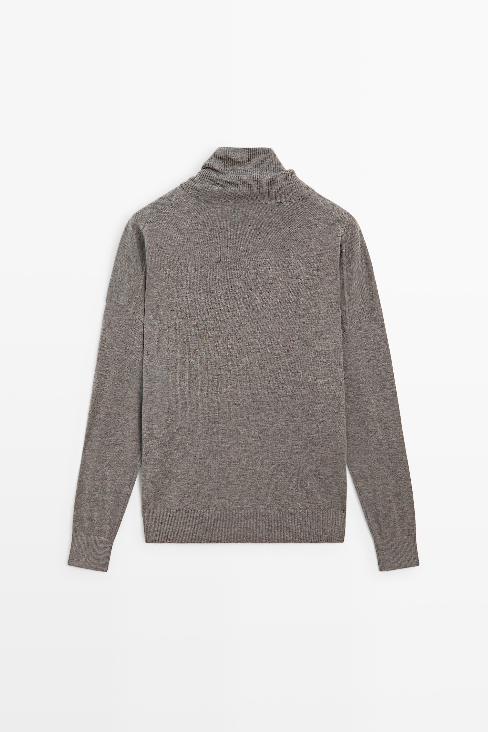 Turtleneck cardigan with button detail